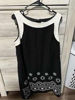 Classic Black & White Sleeveless Mini Dress with Embroidered Hem by J. Howard